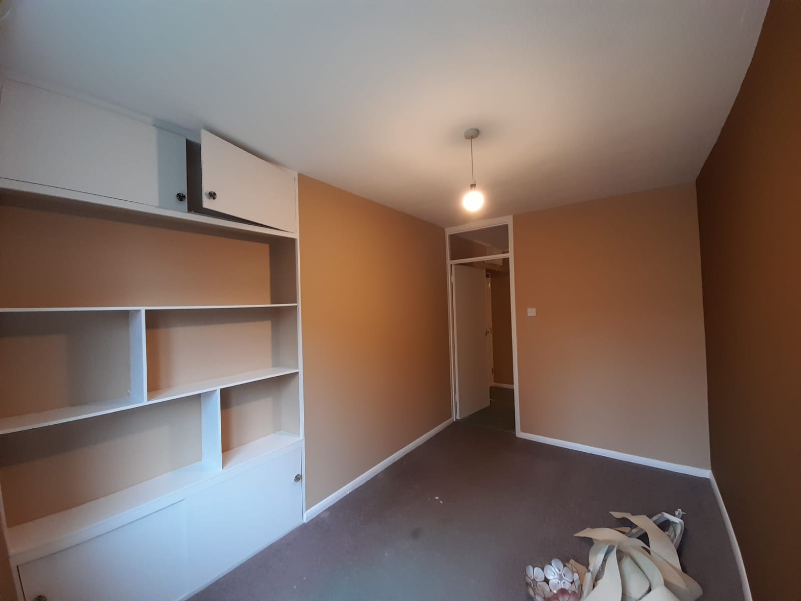 Beautifully painted room with built-in shelving — J&R Painting Brighton